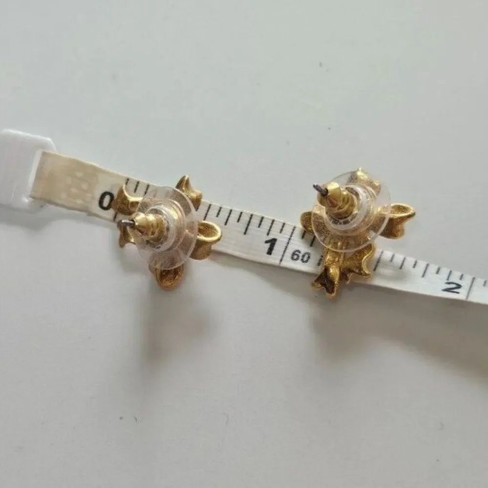 Vintage Avon gold tone bow earrings faux pearl